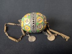 A 19th century enamelled white metal North African Amazigh or Berber Tagemout egg pendant bead