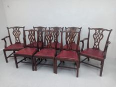 A set of eight late 19th century Georgian style mahogany dining chairs including two carvers each