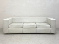 An Italian white leather three seater Throw Away sofa, originally designed by Willie Landels in 1965