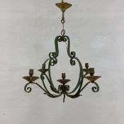A C.1900 French wrought iron chandelier having a scrolling pear shaped open-work body housing a