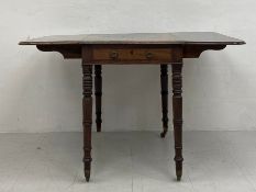 A 19th century mahogany drop leaf Pembroke table having a rectangular thumb-moulded top over a