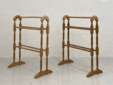 A pair of C.1900 turned and carved pine towel rails. H.77 W.60.5cm