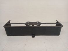 A C.1900 cast iron fire kerb having a shaped openwork stretcher over a curved frieze. W.109 D.31 H.