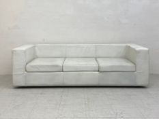 An Italian white leather three seater Throw Away sofa, originally designed by Willie Landels in 1965