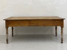 A late 19th century French Cherrywood Refectory style serving table having a rectangular plank top
