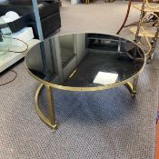 A vintage style gilt metal low table with perspex drop-in top. Dia.70cm