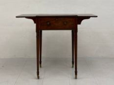A 19th century rosewood drop leaf sewing table having a hinged satinwood inlaid lid opening to