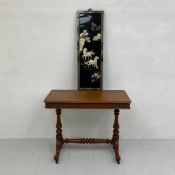 A 19th century mahogany side table having a rectangular top with a crossbanded frieze raised on a