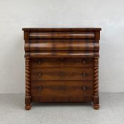 A Victorian Scottish mahogany ogee chest of drawers having a rectangular top over two long shaped