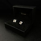 A stylish pair of gentlemen's Zilli cufflinks each having a central square checkerboard-cut smokey
