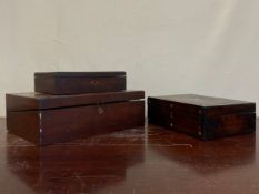A 19th century mahogany writing slope with a baize lined surface and fitted interior along with a