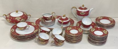 A Japanese part china tea and dinner service by Jyoto to include two lidded tureens, a teapot,