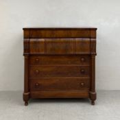A Victorian Scottish mahogany ogee chest of drawers having a rectangular top over one long and three