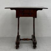 A Regency mahogany drop-leaf occasional table having a rectangular thumb-moulded top over two
