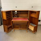 A mid century teak Newcraft Home Office Magic Box desk, fitted with desk lamp. H.112 W.84 D.54cm