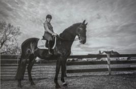 A contemporary large format photograph, portrait of a lady on horseback in a glazed frame. H.74.5