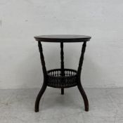 A late 19th century ebonised Aesthetic style occasional table. H.55.5 Dia.46cm