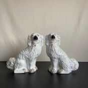 A pair of late 19th century Staffordshire dogs. H.30cm