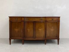 An Edwardian mahogany sideboard with satinwood swag and husk, urn and paterae inlay. H.104 W.185.5