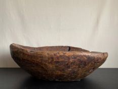 An unusually large 19th century carved sycamore bowl. W.72cm