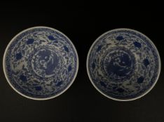 A pair of 20th century Chinese blue and white porcelain export style bowls each having double