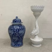 A large contemporary Chinese blue and white lidded temple jar with all-over scrolling foliate