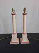 A pair of vintage painted table lamps of Neoclassical column form with stepped capitals over a