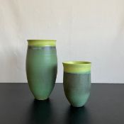 Two green studio pottery style vases. H.28cm (tallest).