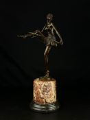 After Dominque Alonzo, an Art Deco patinated bronze figure of a dancing girl with hula hoop,