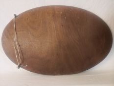 A 20th century wall mirror having an oval bevelled plate in a gilt frame. 82X53cm