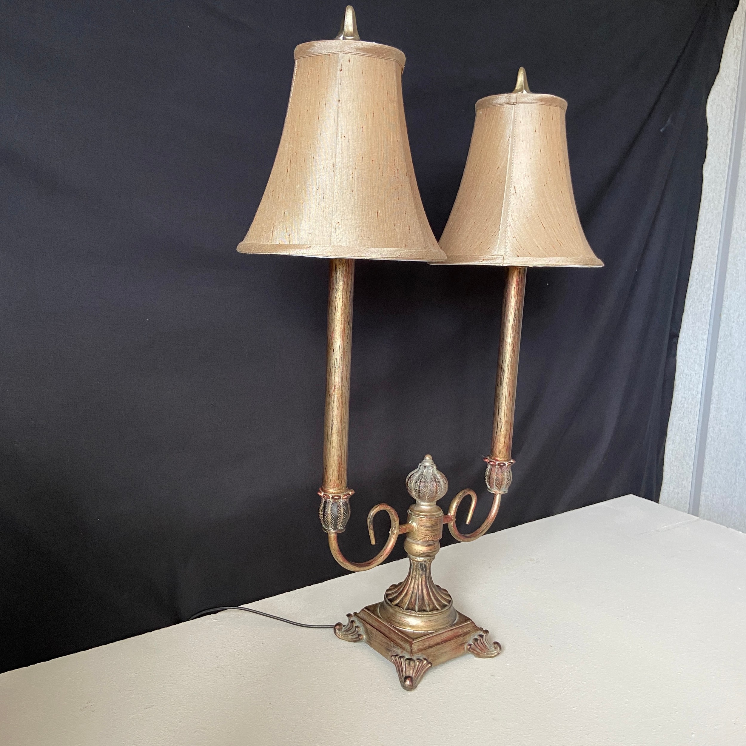 A contemporary cold painted and distressed metal candelabra style table lamp having two branches - Image 2 of 4