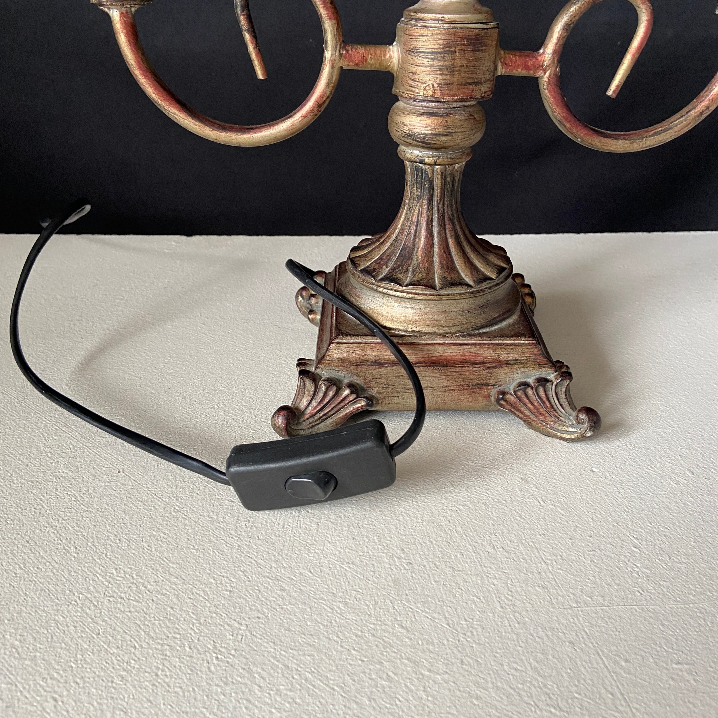 A contemporary cold painted and distressed metal candelabra style table lamp having two branches - Image 4 of 4