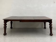 A 19th century mahogany extending dining table on castors with three extra leaves. H.72 W.216 D.