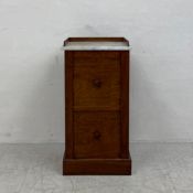 A Louis Philippe flame mahogany bedside cabinet with marble top above a faux twin drawer door