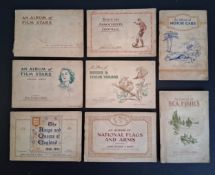 A collection of eight 1930's John Player cigarette card albums with cards.