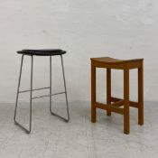 A Hi-Pad bar stool by Jasper Morrison for Cappellini with leather seat and a Jonas Lindvall stool.