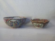 Two Chinese Famille bowls, hand decorated with character marks to base. Dia 31cm.