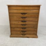 A vintage pine plans chest with seven slides fitted with retractable front covers. H.106 W.94 D.70cm