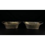 A pair of silver plated basket-weave dishes. W.30.5cm