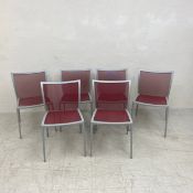 A set of six Zanotta aluminium framed dining chairs with mesh back and seats and maker's stamp to