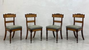 A set of four mid 19th century North European birch and rosewood dining chairs with floral