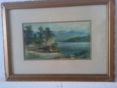 A framed and glazed 19th century watercolour, figures by a lake with distant mountains, signed
