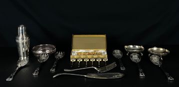 A mixed collection of gold and silver plated fruit spoons, fish servers, cocktail forks and a shaker