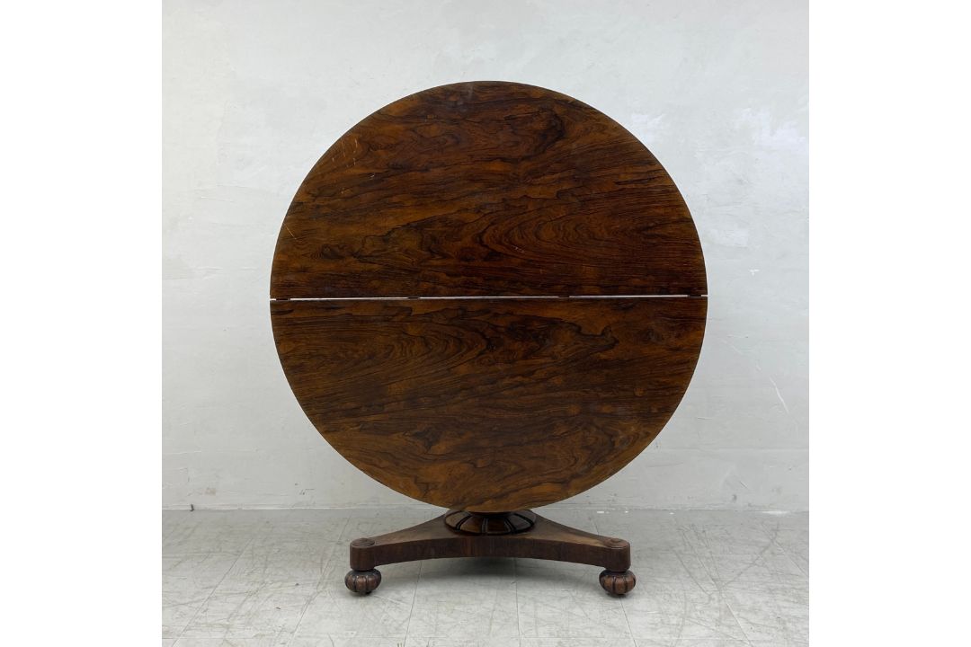 A William IV rosewood tilt top table dining table on triform acanthus carved base. H.73 Dia.128cm ( - Image 1 of 8
