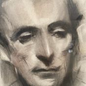 A 20th century charcoal portrait of a gentleman, signed to the lower right in a glazed frame.