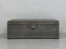A buttoned upholstered box ottoman with lift up seat. H.46 W.130 D.44cm