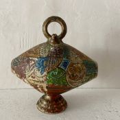 A possibly 19th century Spanish or North African ceramic botijo or water vessel having a ring handle