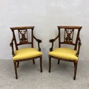 A pair of contemporary Regency style beech elbow chairs in the manner of Thomas Hope each having a