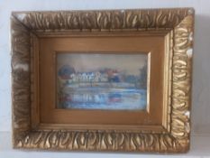 An English school watercolour, town by a river, indistinctly signed, framed and glazed. 26x32cm