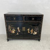 A contemporary Chinese lacquered cabinet having a rectangular hand painted top and two short